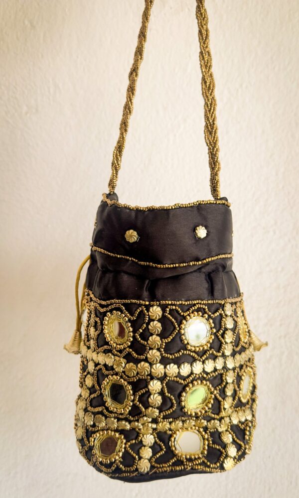 SURI bolsos con espejos